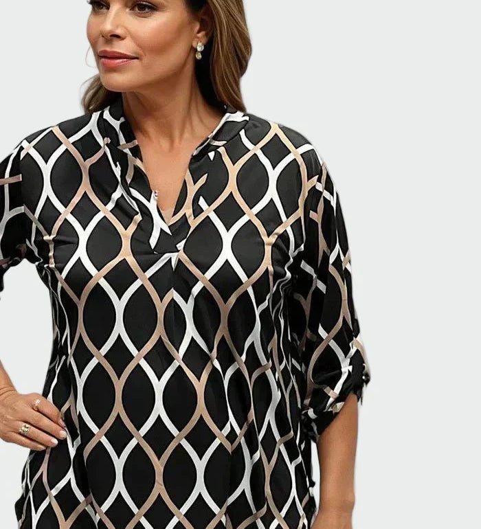 Avslappnad lång tröja med elegant design